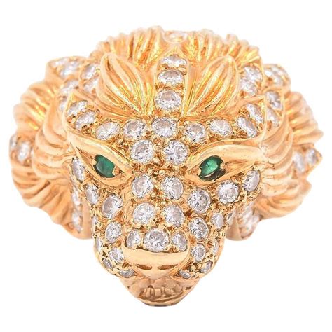 Bague tête de lion 18 carats avec diamants .